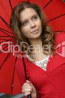 Girl in red under the umbrella