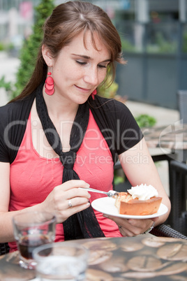 woman eating apple pie