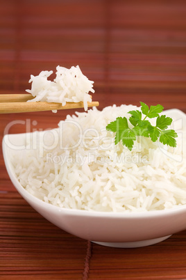 Bowl of rice on mat
