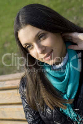Beautiful girl in a park smiling
