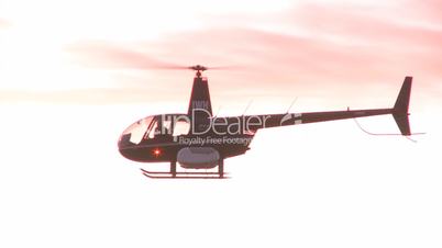 Helicopter hovers over vineyard at dawn