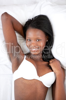 Afro-american woman in underwear relaxing