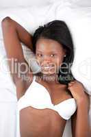 Afro-american woman in underwear relaxing