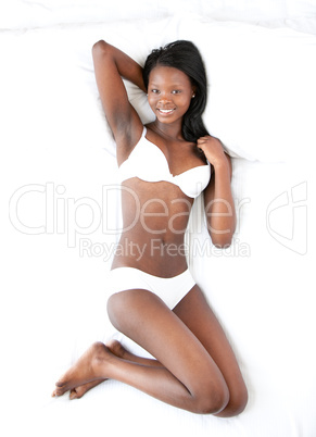 Happy woman in underwear relaxing