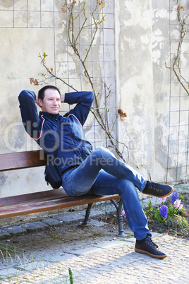 man sitting on a park bench
