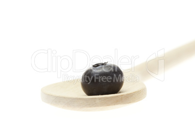 blueberries on the spoon isolated on white blueberries on the spoon isolated on white