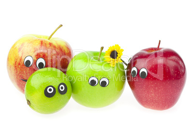 apple and lime with eyes isolated on white