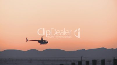 helicopter at dawn