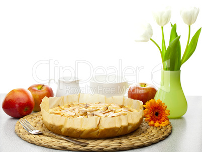 Still life with apple pie, apples and tulips