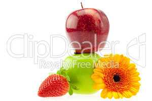 apples, strawberries and a flower isolated on white