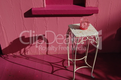 pink porch with table