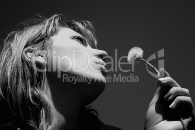 Woman with dandelion