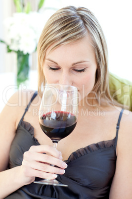Beautiful woman drinking red wine