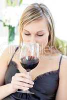 Beautiful woman drinking red wine