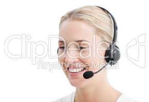 Positive businesswoman with headset on