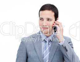 Confident businessman on phone standing