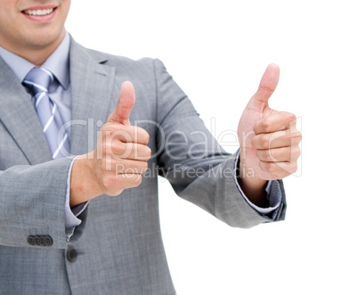 Close-up of a young businessman with thumbs up