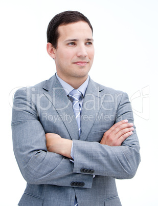 Portrait of a handsome businessman with folded arms standing