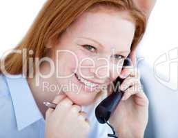 Positive businesswoman taling on phone