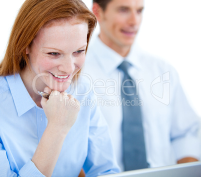 Portrait of a happy businesswoman at her desk