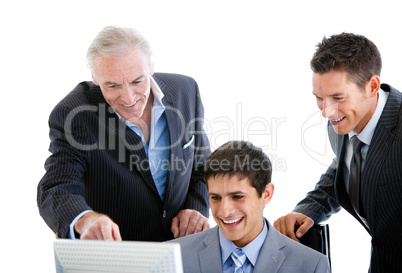 Self-assured businessmen working at a computer