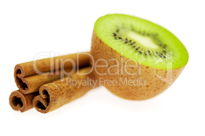 kiwi and cinnamon isolated on white