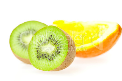 juicy kiwi and oranges isolated on white