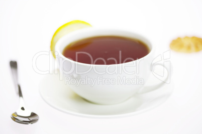 white cup and lemon isolated on white