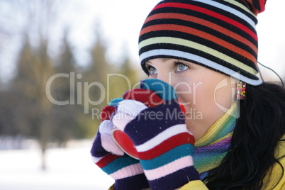 Young Woman in park Holding Mug