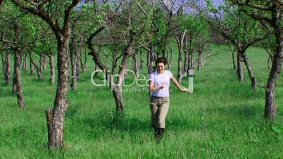 The girl in the apple orchard