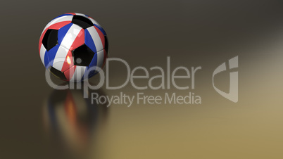 Glossy France soccer ball on golden metal surface
