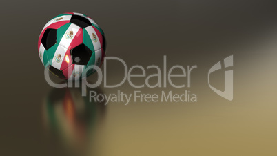 Glossy Mexico soccer ball on golden metal surface