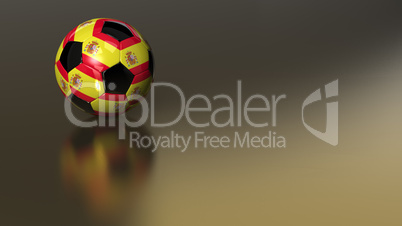 Glossy Spain soccer ball on golden metal surface