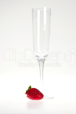 a glass and juicy strawberries