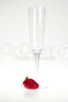 a glass and juicy strawberries