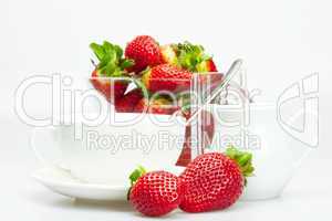 strawberry, white cup and teapot isolated on white