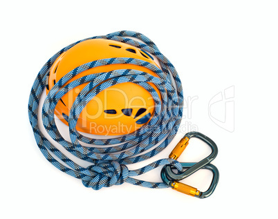 climbing equipment - carabiners, blue rope and helmet