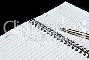 Notebook on a black background