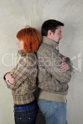 Young man and woman posing