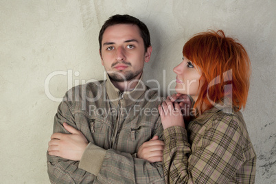 Young man and woman posing