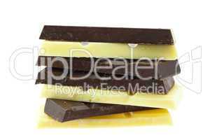 Mount pieces of white and dark chocolate isolated on white