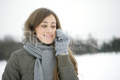 Winter girl on the phone