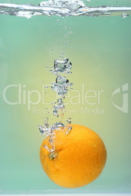 Orange Splash on green background