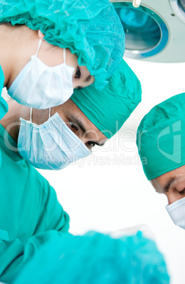 Medical partners looking at the patient