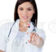 Professionnal female doctor holding a syringe
