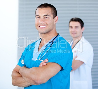Handsome male doctor looking at the camera