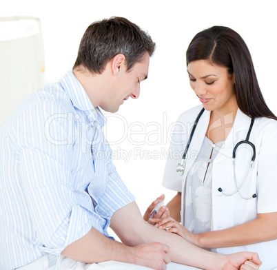 Radiant female doctor making injection to her patient