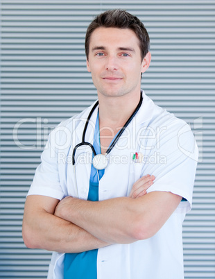 Charismatic male doctor looking at the camera