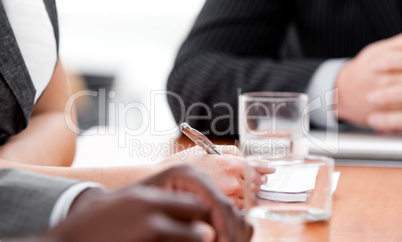 Close-up of international business people in a meeting