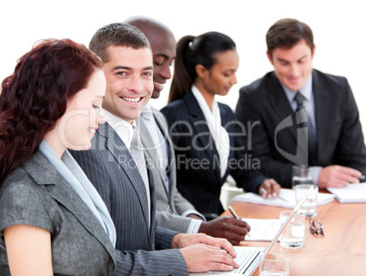 Assertive multi-ethnic business people in a meeting
